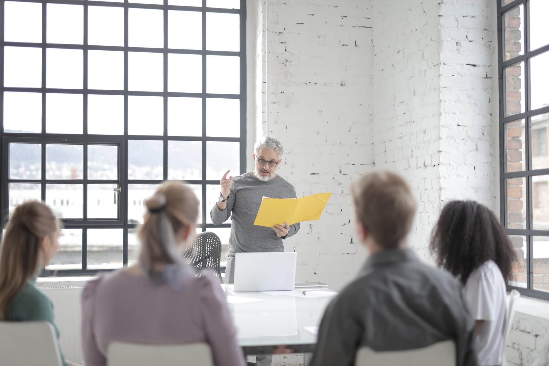 Sales team reviewing annual purchase targets that a distribution agreement will be measured against