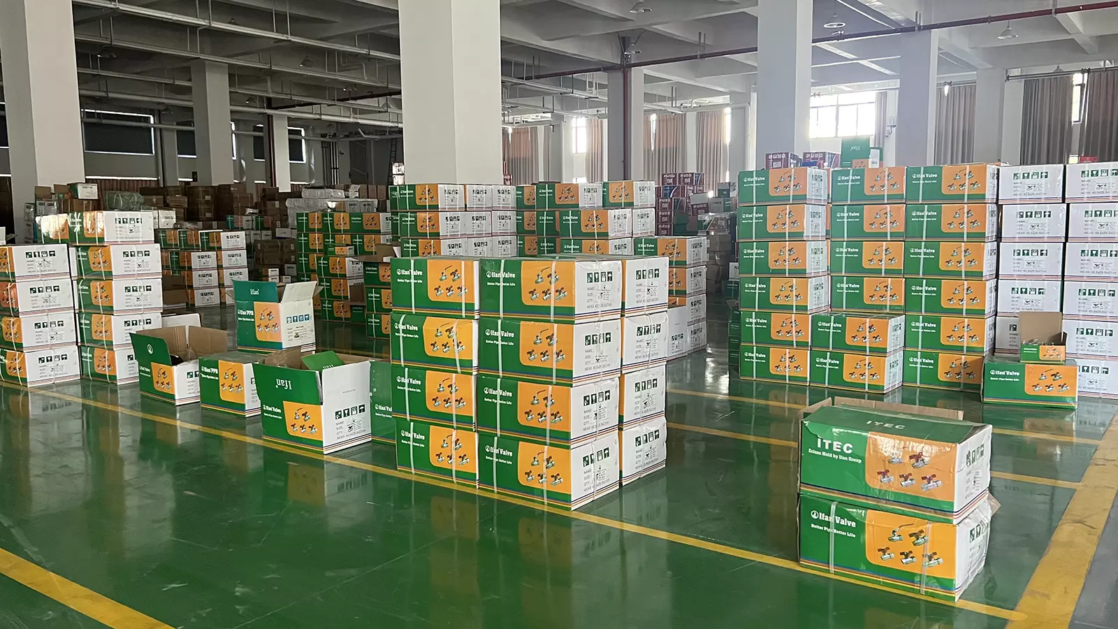 Warehouse stock of pipe fittings ready for container consolidation at the IFANPRO plant