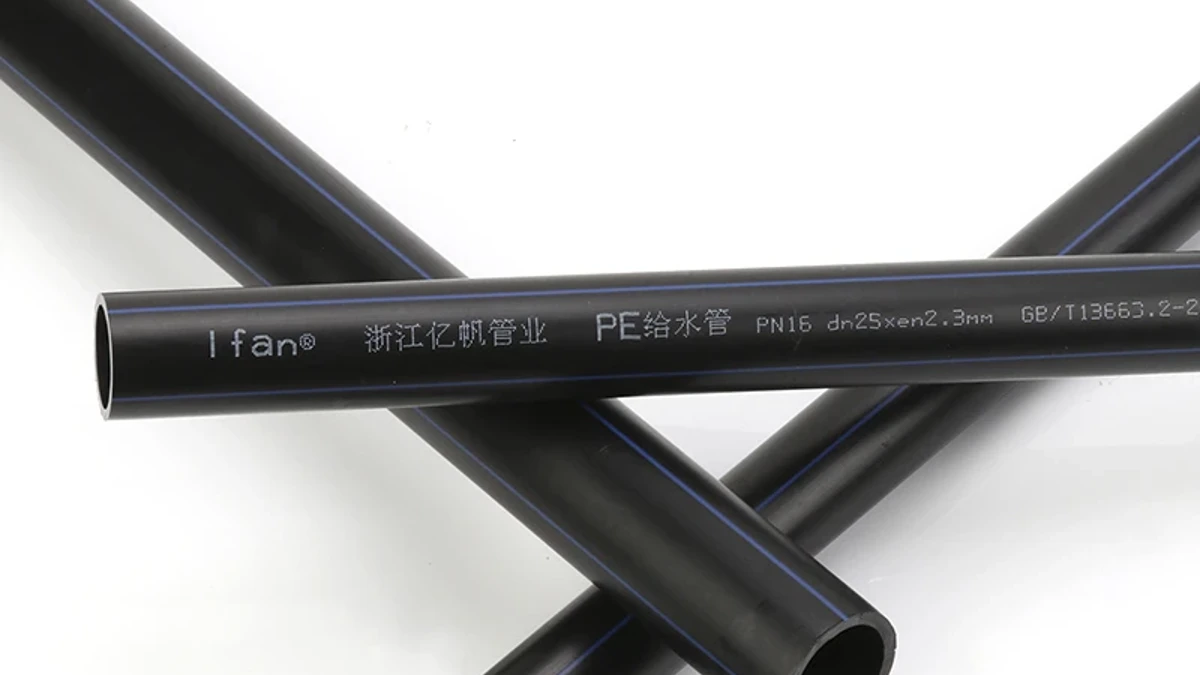 Blue-striped PE pipe with a printed identification line